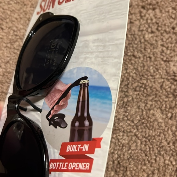 ❗️clearance-price firm❗️ Bottle popping sun glasses- built in bottle opener - Picture 2 of 3